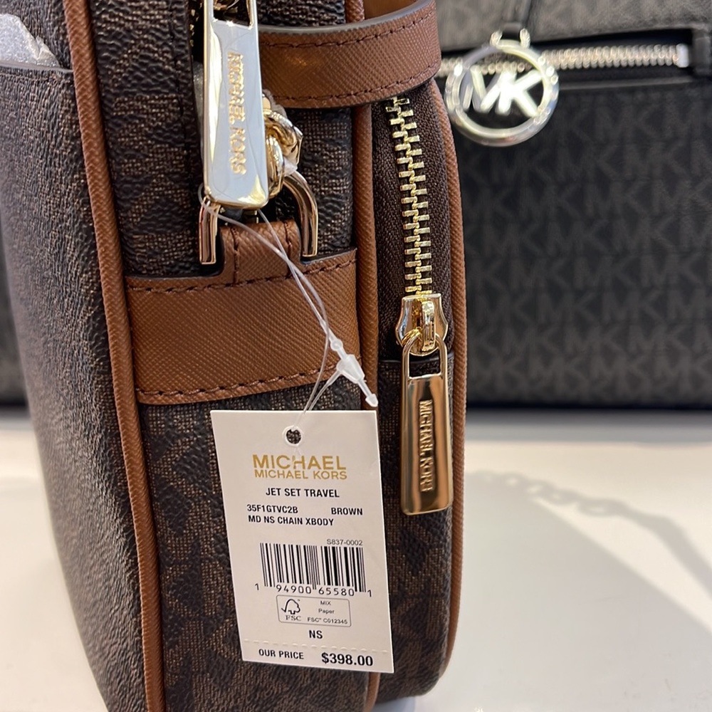 MICHAEL KORS 
Jet Set Travel Medium Logo Crossbody Flight Bag
# 35F1GTVC2B
Brown - Picture 14 of 16